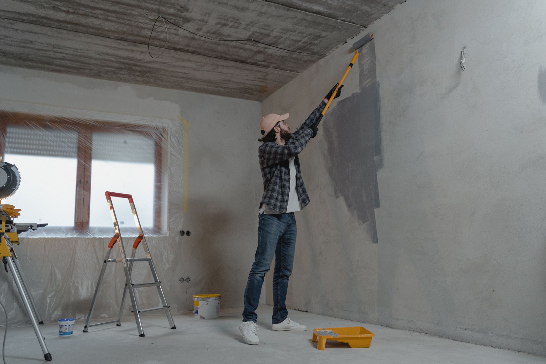 Interior painter using a roller